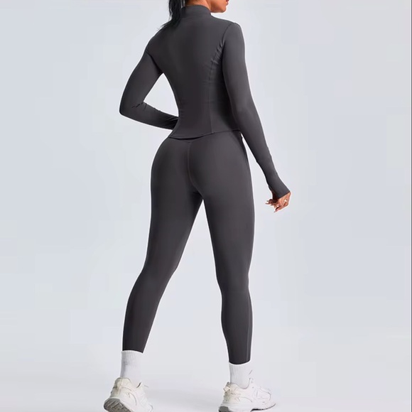 Black Full-Body Jumpsuit with Mock Turtleneck and Long Sleeves - Picture 2 of 4